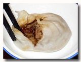 小籠包の皮を破ったところ　大連の不二心